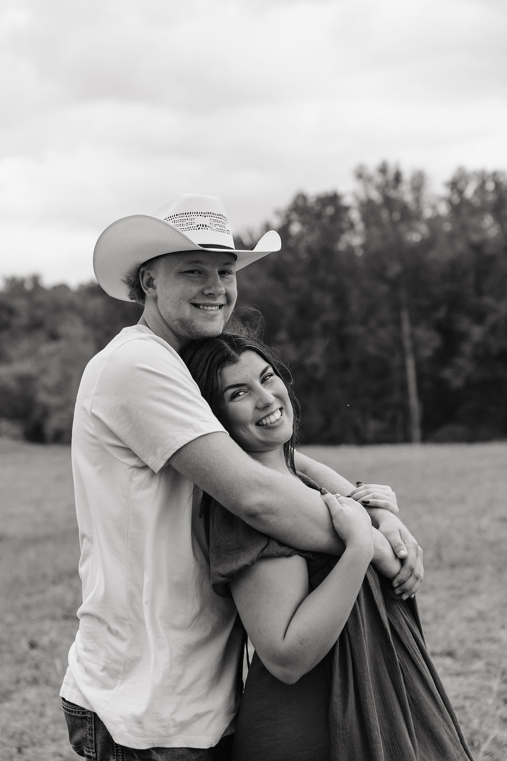 Cody and partner outdoors in an open field